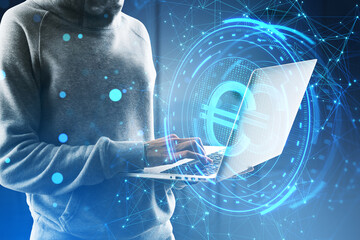 Side view of headless hacker holding laptop computer with creative round euro sign on blurry blue polygonal background. Crypto, hacking, online banking, digital transformation and finance concept. - obrazy, fototapety, plakaty