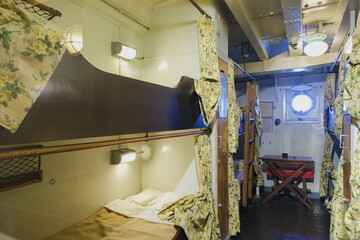 View into bunk bed multi person shared oceanview cabin stateroom onboard historic classic ocean cruiseship cruise ship liner - obrazy, fototapety, plakaty
