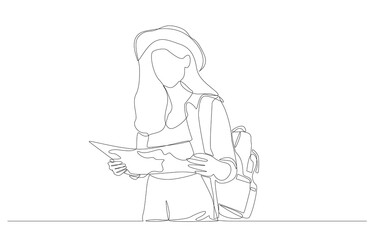 Continuous one line drawing of female tourist backpacker reading map, self-guided tour concept, single line art.
