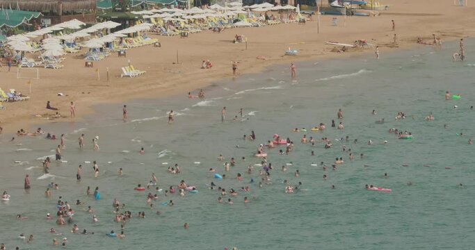 Incekum, Turkey - September 23, 2023: People Swimming At Mediterranean Sea Time Lapse. Famous Tourist Destination. Alanya, Antalya Province. Bay Of Avsallar And Incekum. Travel To Turkey. Vacation.
