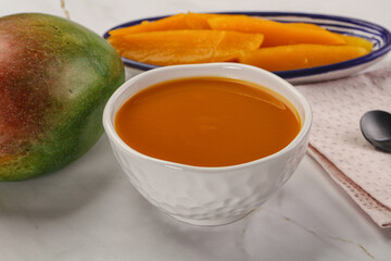 Sweet mango puree in the bowl