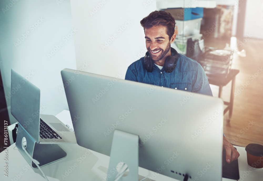 Poster Happy, computer and business man in office for planning, reading email or network online in creative startup. Pc, smile and programmer on internet for information technology, coding and IT software