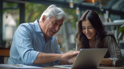 Fototapeta premium Senior Man Guiding Young Woman