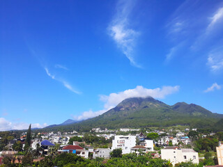 view of the city under the hill during the day