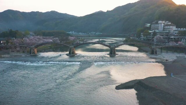 4k Aerial View Kintai Bridge and Iwakuni at Dawn, Spring Sakura Season, Japan
