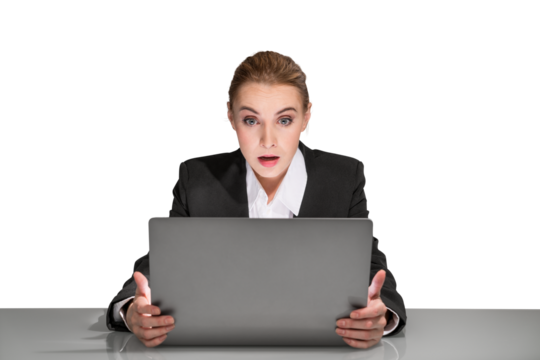 Surprised businesswoman holding a laptop, captured from the chest up, against a white background, depicting shock or disbelief - Powered by Adobe