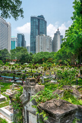 Jalan Ampang Muslim Cemetery,in the heart of KL City,overlooked by tall modern buildings,Kuala Lumpur,Malaysia.