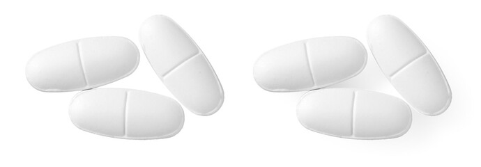 White oval pills isolated on white background, top view. - 786029753