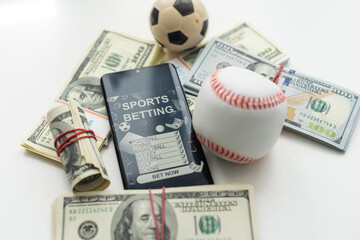 tablet pc with app for sport bets, on top of stacks of banknotes, white background, concept of online bets 3d render