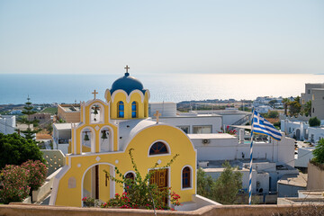 A colourful greek orthodox church in Thira on the islnd of Santorini, Greek Islands, Greece.