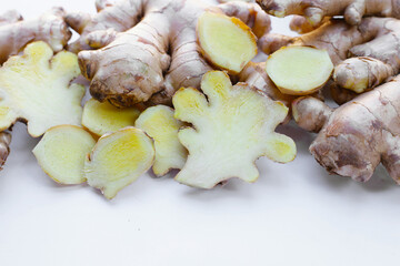 Fresh ginger on white background.