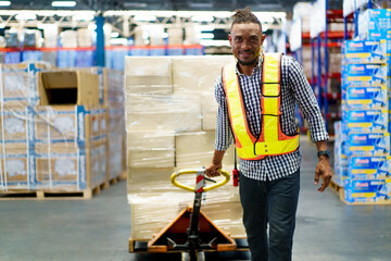Male warehouse worker portrait in the warehouse.