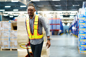 Male warehouse worker portrait in the warehouse.