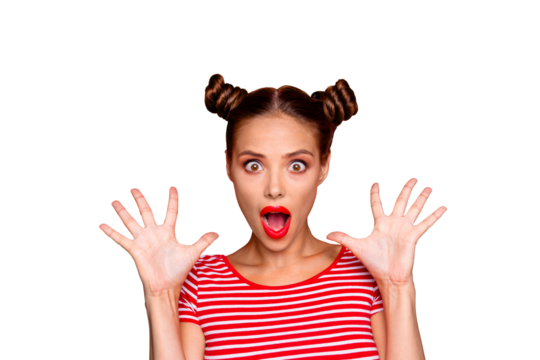 Closeup portrait of shocked girl with brown eyes and red lipstick on the mouse look at the camera with his fingers spread wide. Concept of advertising isolated on red background