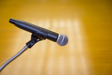 Close up of microphone on a podium in an auditorium