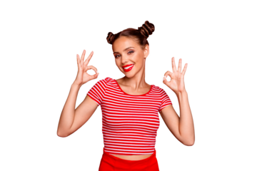 Close up portrait of happy, pretty, confident and smiling girl striped shirt showing ok sign standing on red background