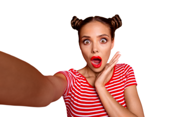 OOPS! Self portrait of cute, trendy and shocked woman with bun hairdo wide open eyes mouth shooting selfie on front camera isolated on red background