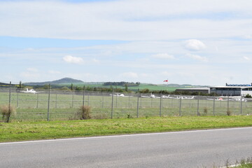 rural airfield in Germany with some planes on the grass