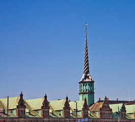 COPENHAGEN, DENMARK - the Old Stock Exchange from 1625 with the spire shaped as the intertwined tails of four dragons, now burned out
