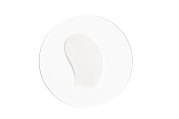 White cream sample on glass on white isolated background. A concert of beauty, moisturizing and...
