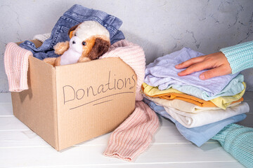 Donation box with clothes, toys and food - 786080524