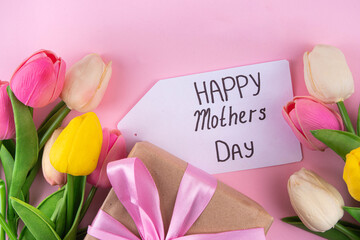 Mother day background with flowers, gift box and Happy Mother Day tag - 786080926