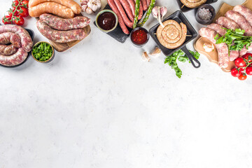 Set of different raw sausages