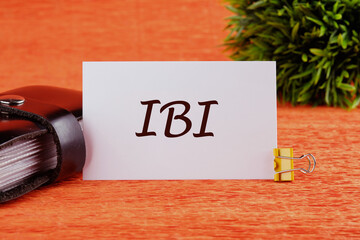 IBI symbol the inscription on the white card. Business concept