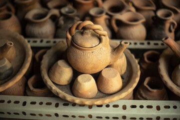 Pottery,powder and water and shaping them into desired forms. Once the ceramic has been shaped,...