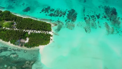 Rolgordijnen Aerial view of a beautiful landscape in the Maldives © Wirestock