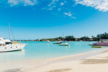 Tropical paradise. Mauritius island holidays, Pereybere beach. View with traditional boat