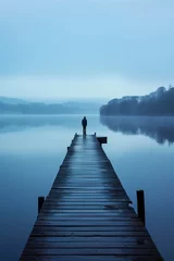 Foto op Plexiglas AI-generated illustration of a solitary figure standing at the end of a jetty looking at a lake © Wirestock