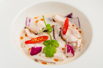 Thai coconut milk soup with chicken and vegetables