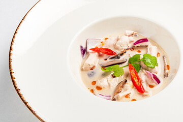 Thai coconut milk soup with chicken and vegetables