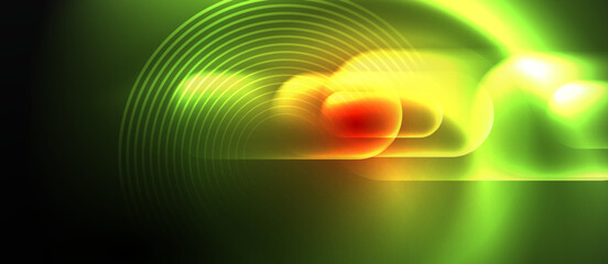 a green and yellow light is shining on a black background . High quality - 786094788