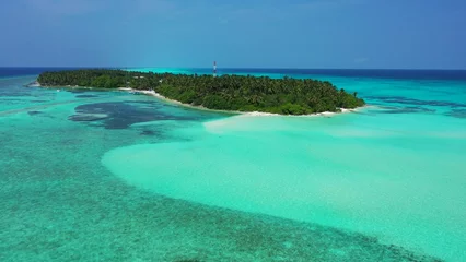 Fototapeten Beautiful tropical island in Maldives © Wirestock