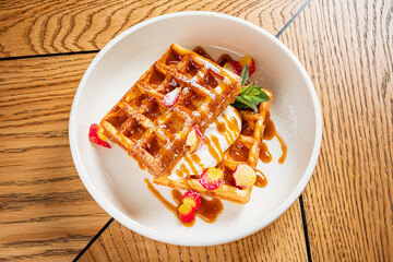 belgian waffle with vanilla sauce