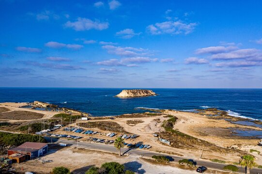 Top view of the inhabited Geronisos island surrounded by a blue seascape in Cyprus