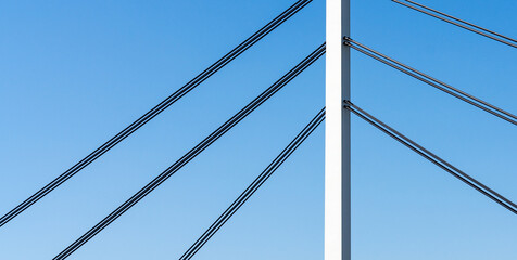 Close-up construction elements of pylon cable-stayed bridge. - obrazy, fototapety, plakaty