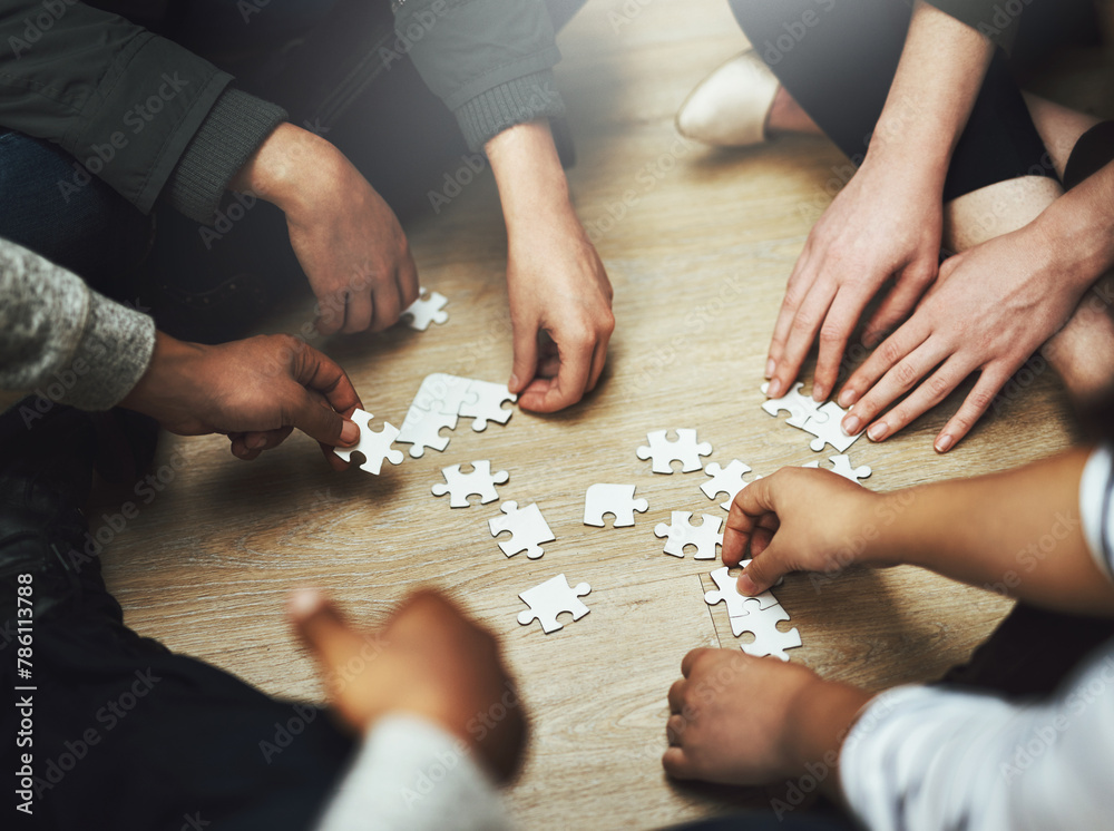Aufkleber People, teamwork and hands with puzzle on floor for problem solving, support and integration of strategy. Team, diversity and training with jigsaw for creative interaction, collaboration and learning