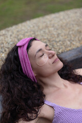 Woman in Purple Top close up in spa bath - 786114361