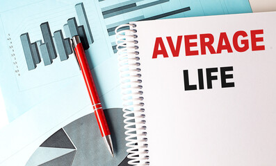 AVERAGE LIFE text on notebook on chart background