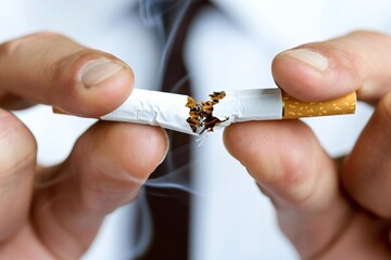 Man Breaking Cigarette - Prevention of Unhealthy Habit with Smoke Stop