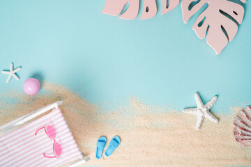 beach background in pastel colors with beach accessories, sun lounger, slippers, starfish, sunglasses, copy space