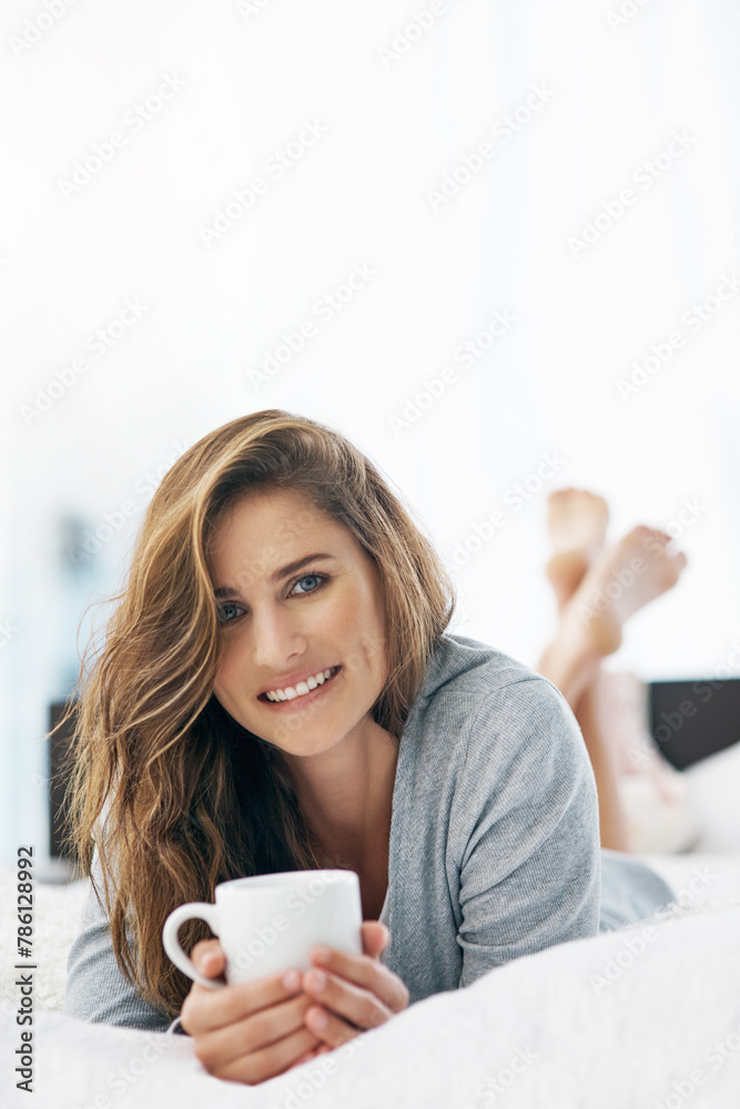 Poster Girl, portrait and smile on bed for tea for weekend break, peace or wellness in apartment or home. Wake up, morning or happy woman resting on holiday vacation or day off drinking coffee or beverage