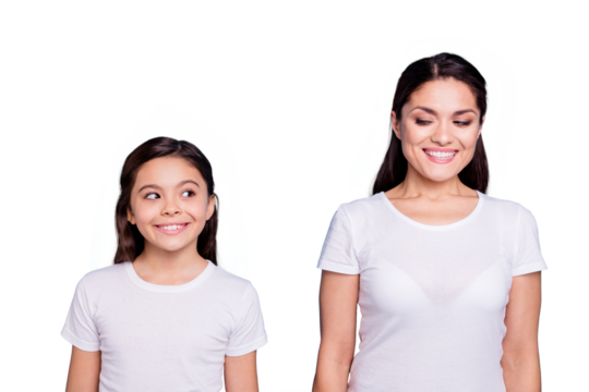 Close up photo amazing pretty two people brown haired mum and small daughter standing straight looking side each other cunning wearing white t-shirts isolated on bright blue background