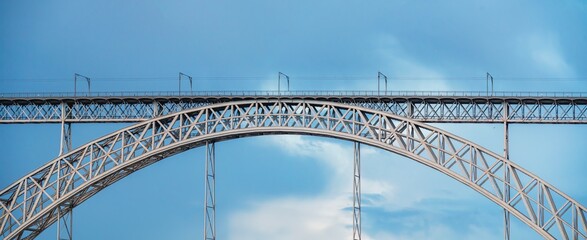 Frontal view from the river of the steel bridge Don Luis I. Douro river in Porto. Lisbon.
