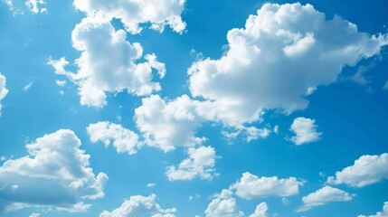 Clean and clear blue sky on sunny day with clouds on it. - obrazy, fototapety, plakaty