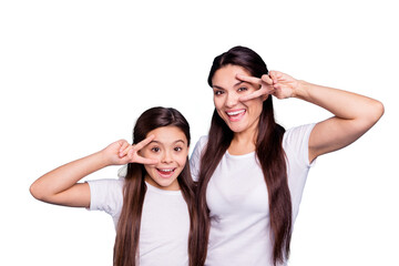 Close up photo cheer two people brown haired mum small little daughter hands arms fingers show v-sign say hi yell delighted amazed wear white t-shirts isolated bright blue background