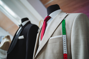 a suit with a measuring tape attached to it